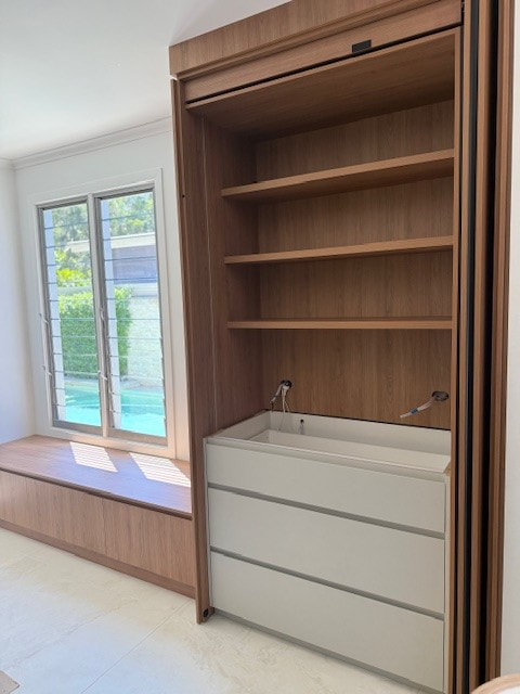 Custom timber cabinetry with a built in window seat